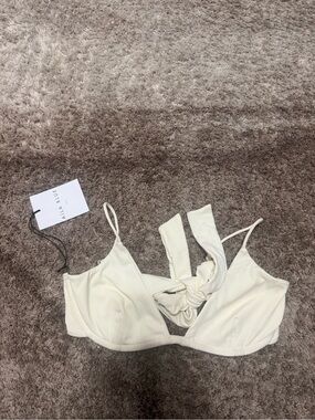 Aila blue Mira swim top in color ivory